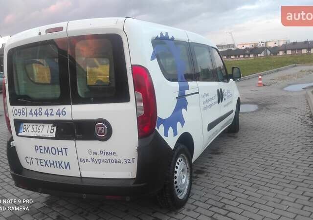 Белый Фиат Добло, объемом двигателя 1.25 л и пробегом 165 тыс. км за 8458 $, фото 6 на Automoto.ua
