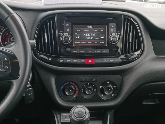 Белый Фиат Добло, объемом двигателя 1.4 л и пробегом 88 тыс. км за 10990 $, фото 12 на Automoto.ua