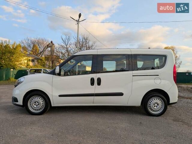 Белый Фиат Добло, объемом двигателя 1.3 л и пробегом 100 тыс. км за 10800 $, фото 4 на Automoto.ua