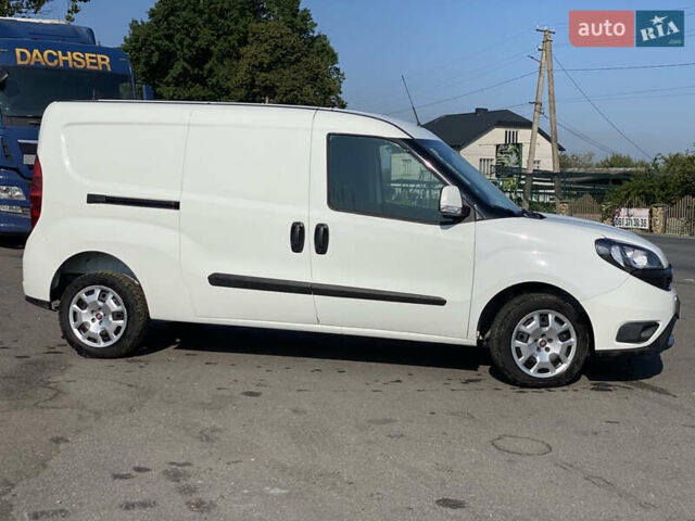 Белый Фиат Добло, объемом двигателя 1.6 л и пробегом 182 тыс. км за 11450 $, фото 1 на Automoto.ua