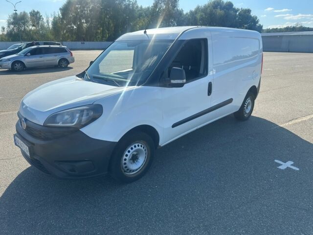 Белый Фиат Добло, объемом двигателя 1.4 л и пробегом 321 тыс. км за 7400 $, фото 3 на Automoto.ua