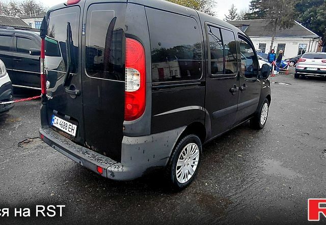 Черный Фиат Добло, объемом двигателя 1.4 л и пробегом 265 тыс. км за 3500 $, фото 2 на Automoto.ua