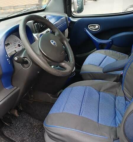 Черный Фиат Добло, объемом двигателя 1.9 л и пробегом 182 тыс. км за 5750 $, фото 16 на Automoto.ua