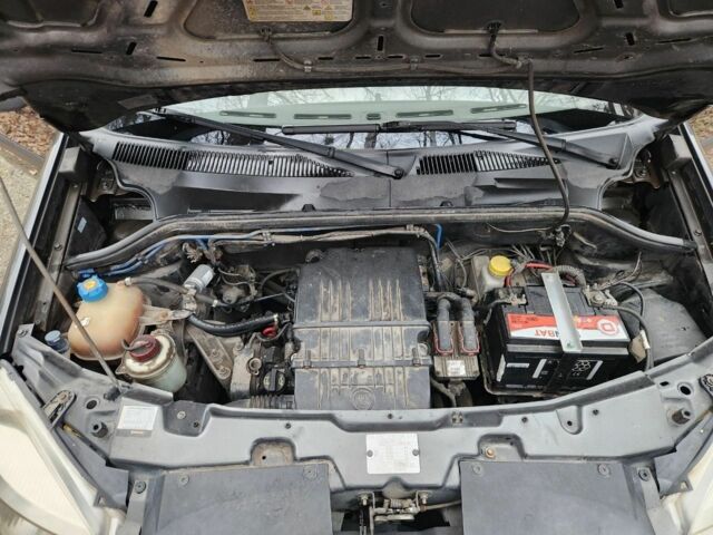 Черный Фиат Добло, объемом двигателя 1.4 л и пробегом 211 тыс. км за 4200 $, фото 7 на Automoto.ua