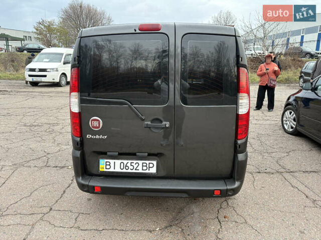 Черный Фиат Добло, объемом двигателя 1.37 л и пробегом 210 тыс. км за 5200 $, фото 2 на Automoto.ua