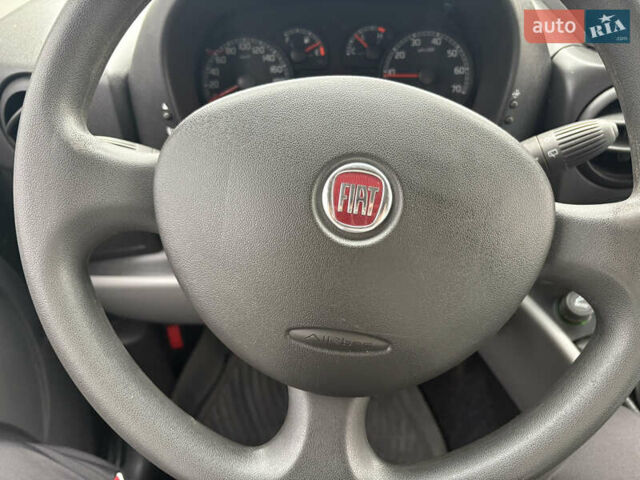 Черный Фиат Добло, объемом двигателя 1.37 л и пробегом 210 тыс. км за 5200 $, фото 6 на Automoto.ua