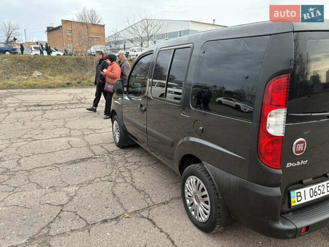 Черный Фиат Добло, объемом двигателя 1.37 л и пробегом 210 тыс. км за 5200 $, фото 3 на Automoto.ua