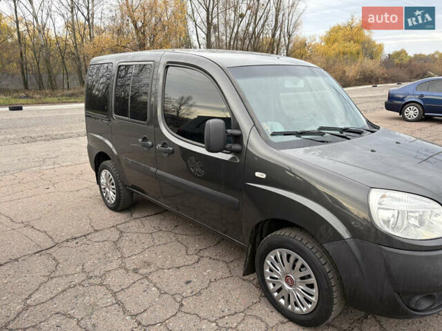 Черный Фиат Добло, объемом двигателя 1.37 л и пробегом 210 тыс. км за 5200 $, фото 1 на Automoto.ua