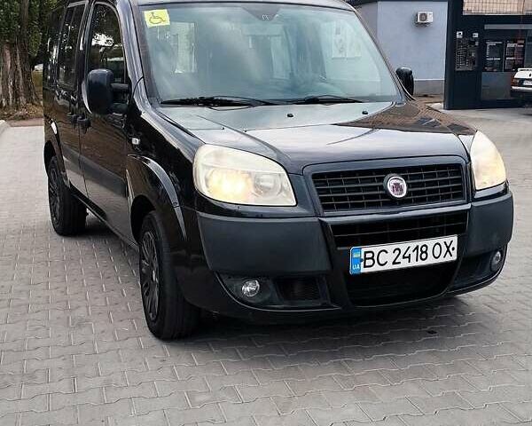 Черный Фиат Добло, объемом двигателя 1.4 л и пробегом 153 тыс. км за 7500 $, фото 1 на Automoto.ua