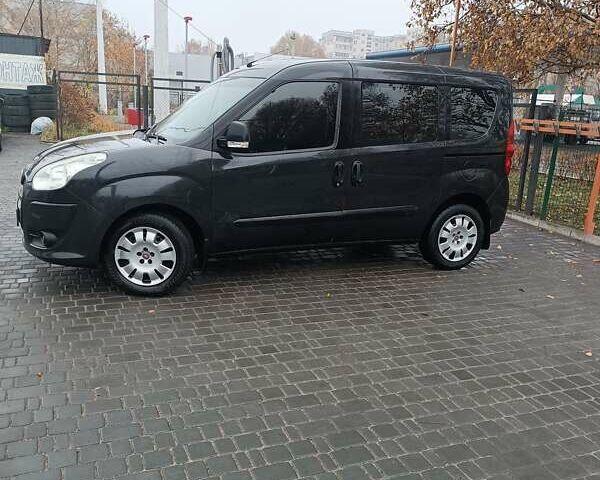 Черный Фиат Добло, объемом двигателя 1.37 л и пробегом 180 тыс. км за 6700 $, фото 9 на Automoto.ua
