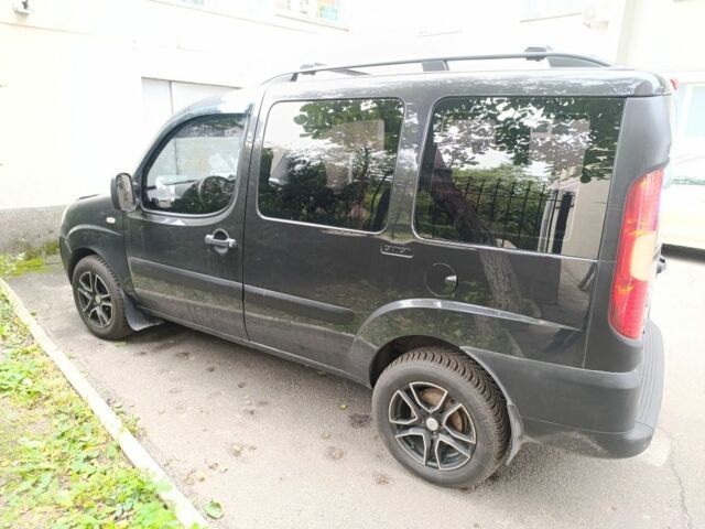 Черный Фиат Добло, объемом двигателя 1.3 л и пробегом 170 тыс. км за 8050 $, фото 3 на Automoto.ua