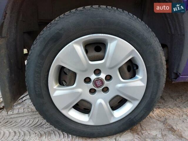 Фіолетовий Фіат Добло, об'ємом двигуна 1.25 л та пробігом 280 тис. км за 5099 $, фото 26 на Automoto.ua