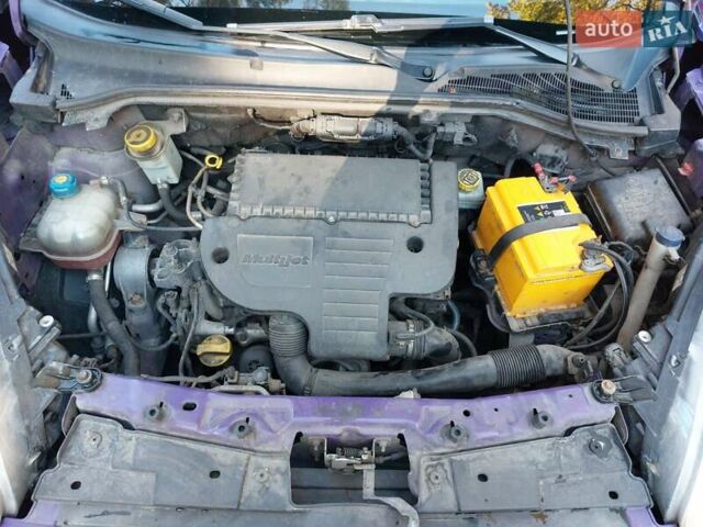 Фіолетовий Фіат Добло, об'ємом двигуна 1.25 л та пробігом 280 тис. км за 5099 $, фото 20 на Automoto.ua