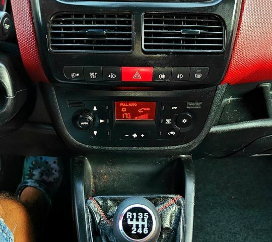 Червоний Фіат Добло, об'ємом двигуна 1.6 л та пробігом 230 тис. км за 5300 $, фото 12 на Automoto.ua