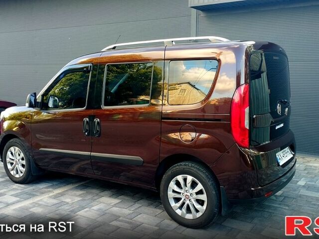 Красный Фиат Добло, объемом двигателя 1.4 л и пробегом 75 тыс. км за 11900 $, фото 1 на Automoto.ua