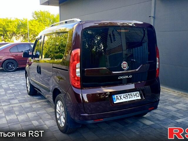 Красный Фиат Добло, объемом двигателя 1.4 л и пробегом 75 тыс. км за 11900 $, фото 4 на Automoto.ua