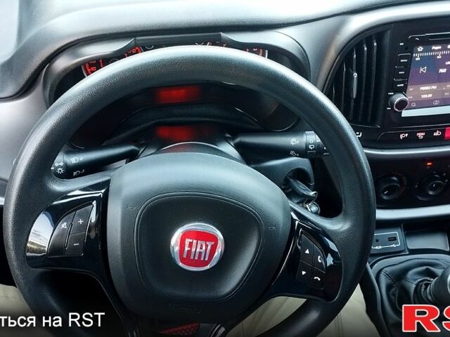 Красный Фиат Добло, объемом двигателя 1.4 л и пробегом 75 тыс. км за 11900 $, фото 7 на Automoto.ua