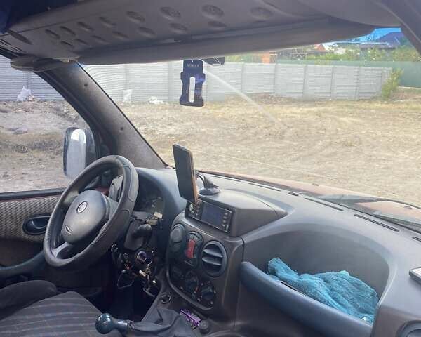 Красный Фиат Добло, объемом двигателя 1.91 л и пробегом 200 тыс. км за 2500 $, фото 7 на Automoto.ua