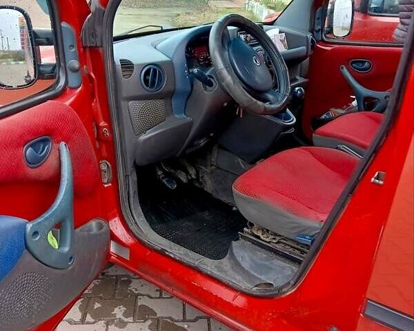 Красный Фиат Добло, объемом двигателя 1.91 л и пробегом 315 тыс. км за 3350 $, фото 5 на Automoto.ua