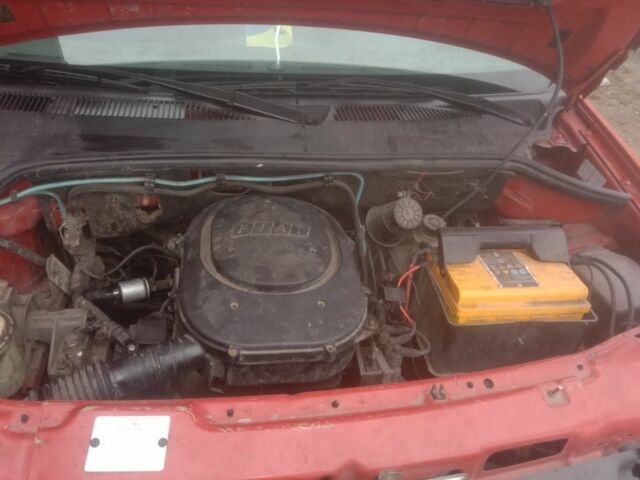 Красный Фиат Добло, объемом двигателя 1 л и пробегом 200 тыс. км за 1894 $, фото 6 на Automoto.ua