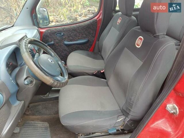 Красный Фиат Добло, объемом двигателя 1.91 л и пробегом 330 тыс. км за 3800 $, фото 11 на Automoto.ua