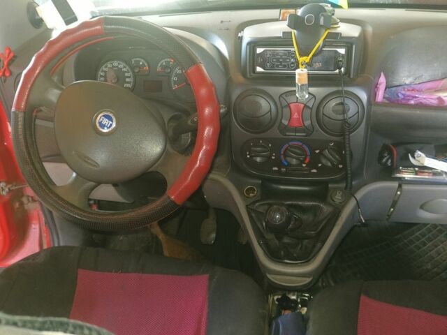 Красный Фиат Добло, объемом двигателя 1.2 л и пробегом 250 тыс. км за 2600 $, фото 2 на Automoto.ua