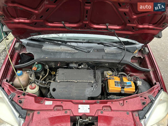 Красный Фиат Добло, объемом двигателя 1.3 л и пробегом 280 тыс. км за 5200 $, фото 12 на Automoto.ua