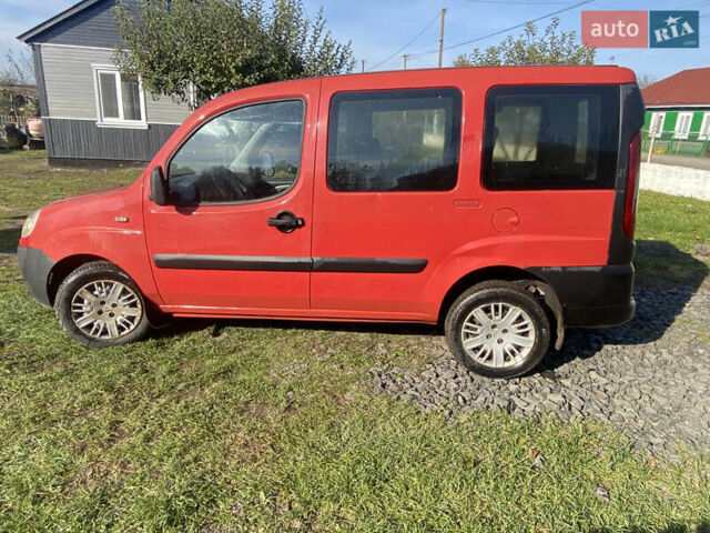 Красный Фиат Добло, объемом двигателя 1.2 л и пробегом 350 тыс. км за 3500 $, фото 5 на Automoto.ua