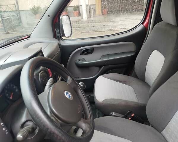 Красный Фиат Добло, объемом двигателя 1.3 л и пробегом 299 тыс. км за 6000 $, фото 12 на Automoto.ua