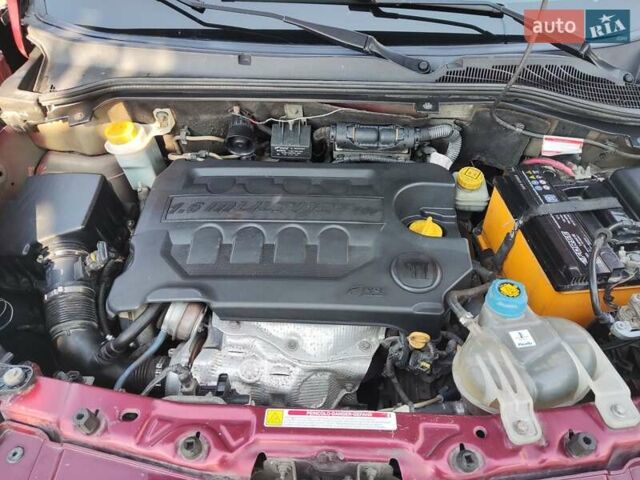 Красный Фиат Добло, объемом двигателя 1.6 л и пробегом 271 тыс. км за 7500 $, фото 24 на Automoto.ua