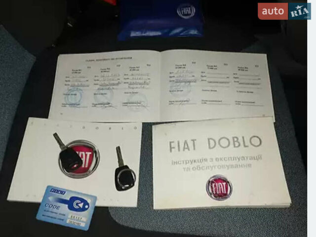 Красный Фиат Добло, объемом двигателя 1.4 л и пробегом 205 тыс. км за 7000 $, фото 3 на Automoto.ua