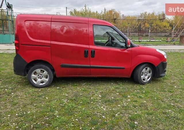 Красный Фиат Добло, объемом двигателя 1.25 л и пробегом 250 тыс. км за 4200 $, фото 11 на Automoto.ua