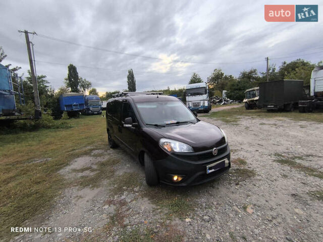 Красный Фиат Добло, объемом двигателя 1.6 л и пробегом 220 тыс. км за 10500 $, фото 4 на Automoto.ua