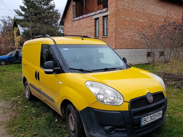 Желтый Фиат Добло, объемом двигателя 1.2 л и пробегом 348 тыс. км за 4300 $, фото 1 на Automoto.ua