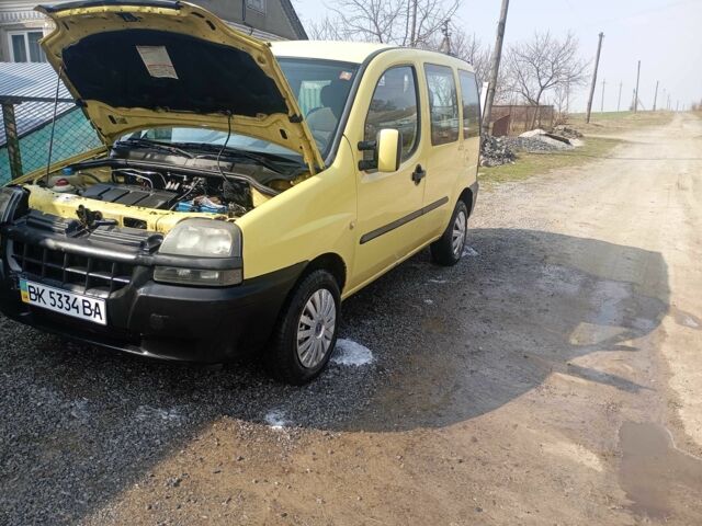 Желтый Фиат Добло, объемом двигателя 1.9 л и пробегом 289 тыс. км за 4099 $, фото 1 на Automoto.ua