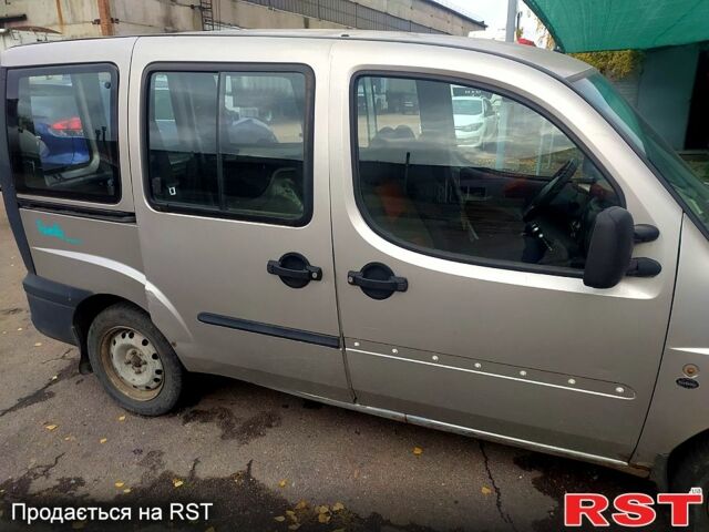 Серый Фиат Добло, объемом двигателя 1.9 л и пробегом 250 тыс. км за 1550 $, фото 2 на Automoto.ua