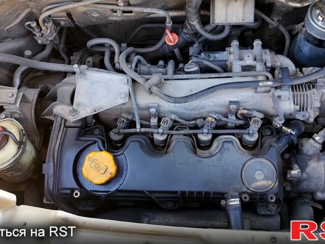 Серый Фиат Добло, объемом двигателя 1.9 л и пробегом 412 тыс. км за 3500 $, фото 2 на Automoto.ua