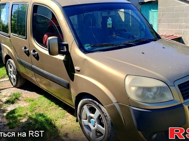 Серый Фиат Добло, объемом двигателя 1.9 л и пробегом 412 тыс. км за 3500 $, фото 1 на Automoto.ua