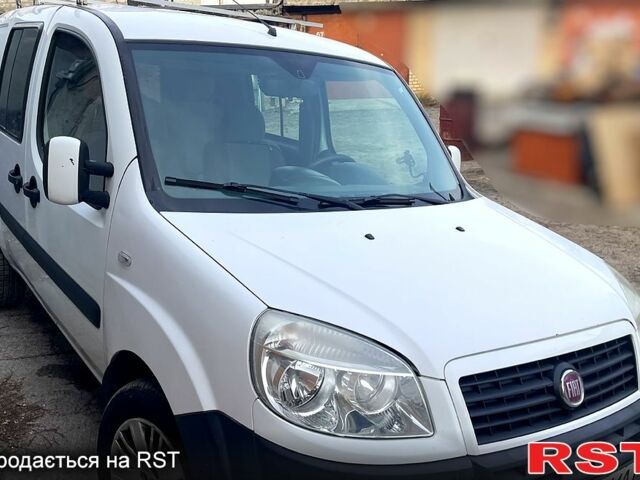 Серый Фиат Добло, объемом двигателя 1.5 л и пробегом 202 тыс. км за 4950 $, фото 2 на Automoto.ua