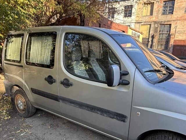 Серый Фиат Добло, объемом двигателя 1.2 л и пробегом 200 тыс. км за 1650 $, фото 1 на Automoto.ua