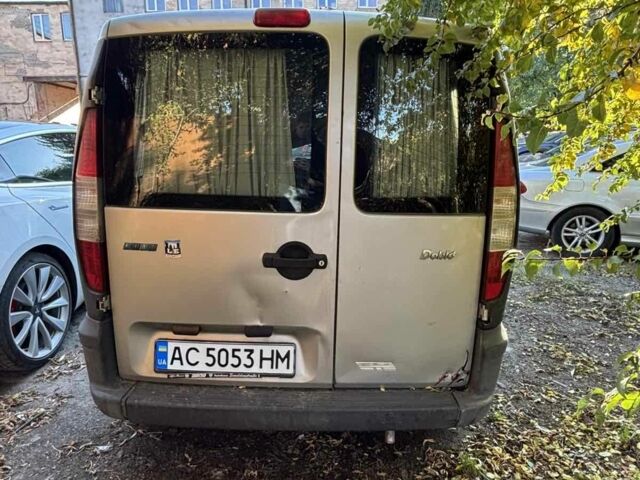 Серый Фиат Добло, объемом двигателя 1.2 л и пробегом 200 тыс. км за 1650 $, фото 2 на Automoto.ua