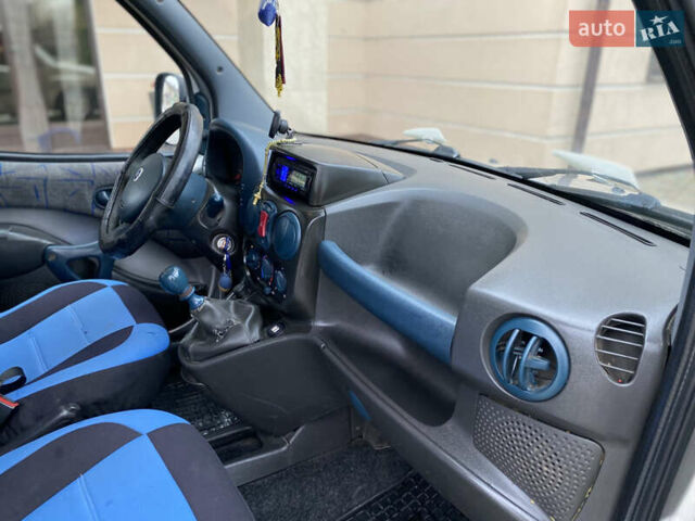 Серый Фиат Добло, объемом двигателя 1.6 л и пробегом 205 тыс. км за 3350 $, фото 40 на Automoto.ua