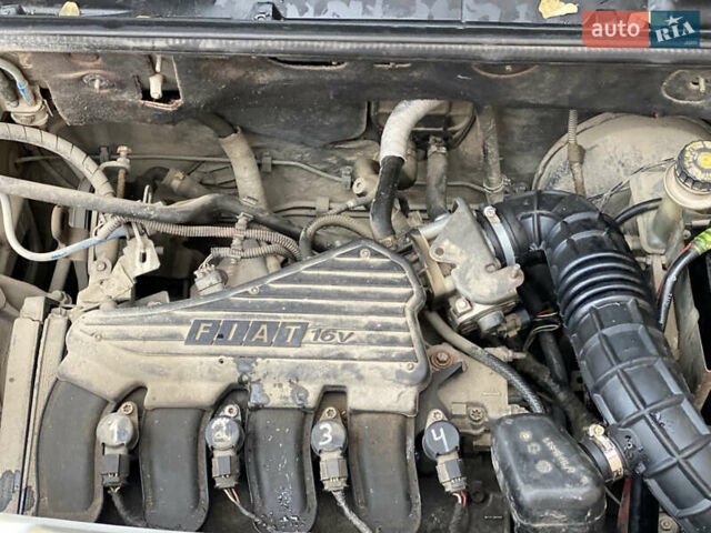 Серый Фиат Добло, объемом двигателя 1.6 л и пробегом 205 тыс. км за 3350 $, фото 59 на Automoto.ua
