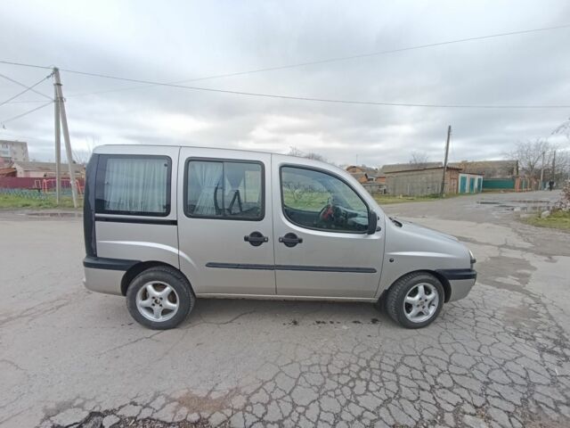 Серый Фиат Добло, объемом двигателя 1.9 л и пробегом 260 тыс. км за 3300 $, фото 1 на Automoto.ua