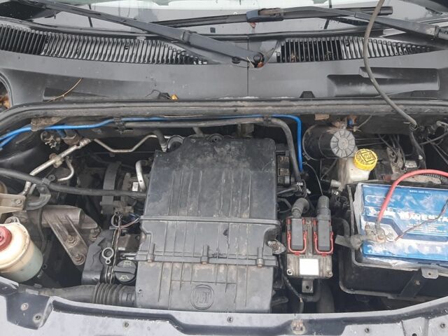 Серый Фиат Добло, объемом двигателя 1.4 л и пробегом 250 тыс. км за 3000 $, фото 2 на Automoto.ua