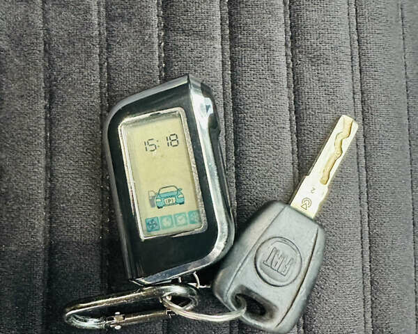 Серый Фиат Добло, объемом двигателя 1.6 л и пробегом 260 тыс. км за 12150 $, фото 21 на Automoto.ua