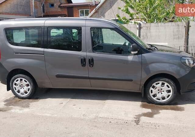 Серый Фиат Добло, объемом двигателя 1.37 л и пробегом 190 тыс. км за 13900 $, фото 2 на Automoto.ua
