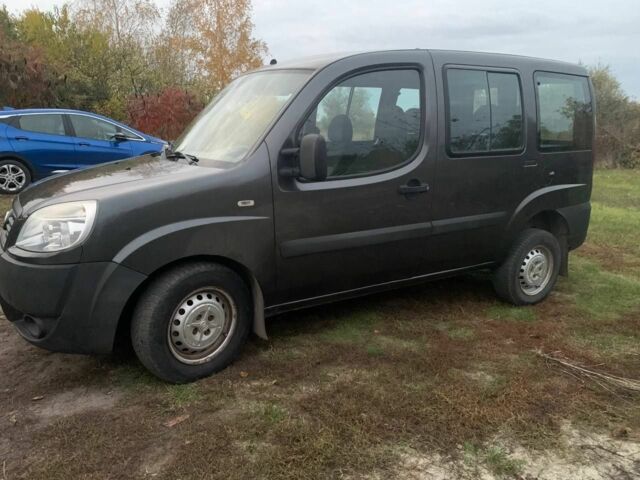 Серый Фиат Добло, объемом двигателя 1.4 л и пробегом 137 тыс. км за 5900 $, фото 1 на Automoto.ua