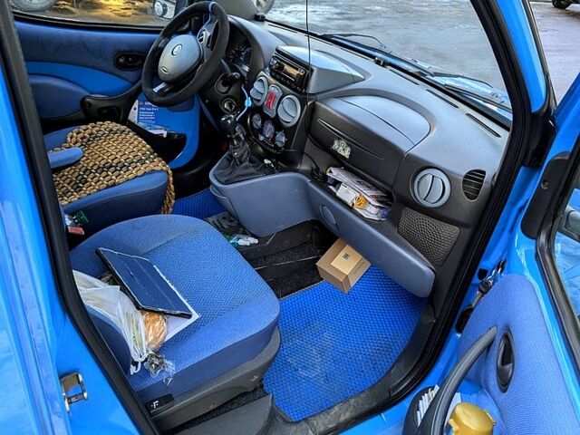 Синий Фиат Добло, объемом двигателя 1.6 л и пробегом 380 тыс. км за 2500 $, фото 5 на Automoto.ua