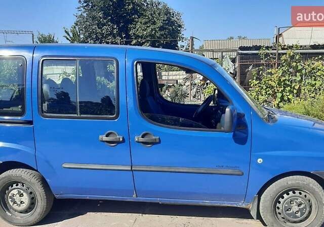 Синий Фиат Добло, объемом двигателя 1.2 л и пробегом 190 тыс. км за 4000 $, фото 4 на Automoto.ua